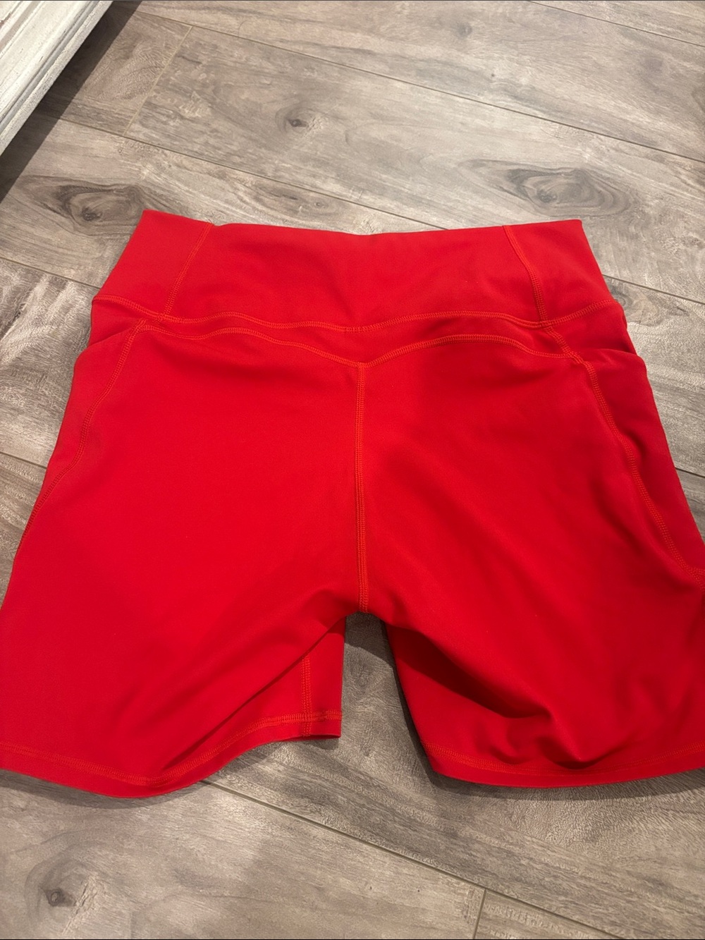 Fabletics Red High-Waist Pocket Bike Shorts - Picture 3 of 4